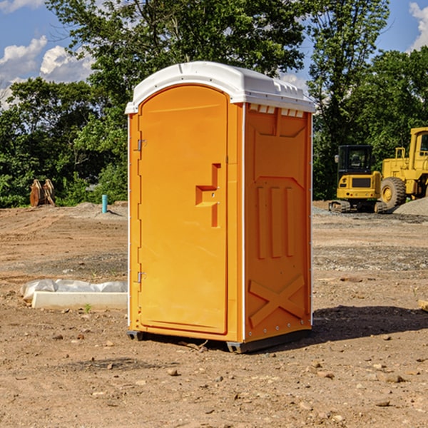 how often are the porta potties cleaned and serviced during a rental period in Roland